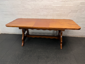 Extendable Wooden Trestle Dining Table — Visible Marks and Wear on Table Top