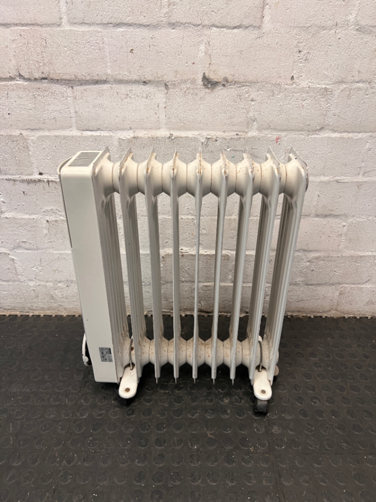 Fust Novamatic Oil-Filled Heater with Castors — Working Order with Visible Wear