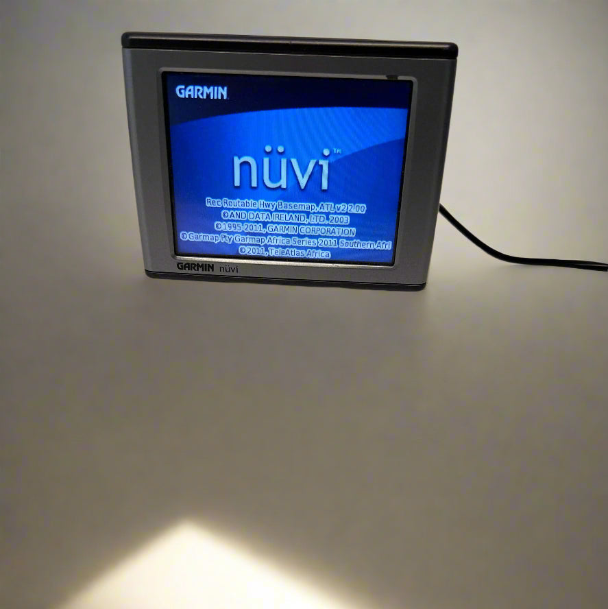Garmin nuvi GPS device on a white surface