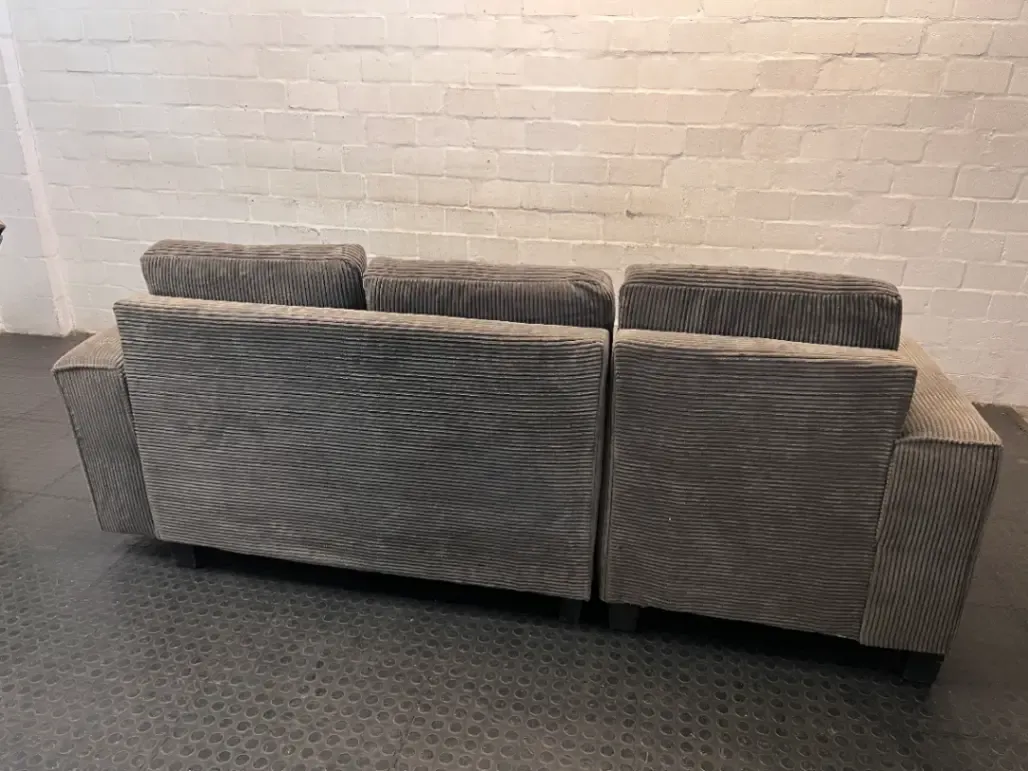 Grey Corduroy L-Shape Couch with Ottoman — One Broken Leg