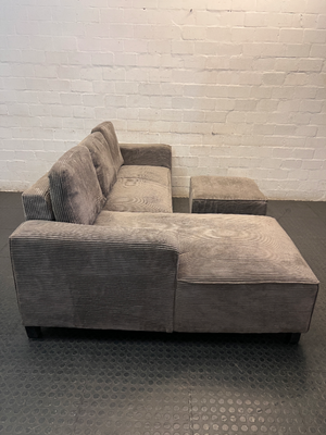 Grey Corduroy L-Shape Couch with Ottoman — One Broken Leg