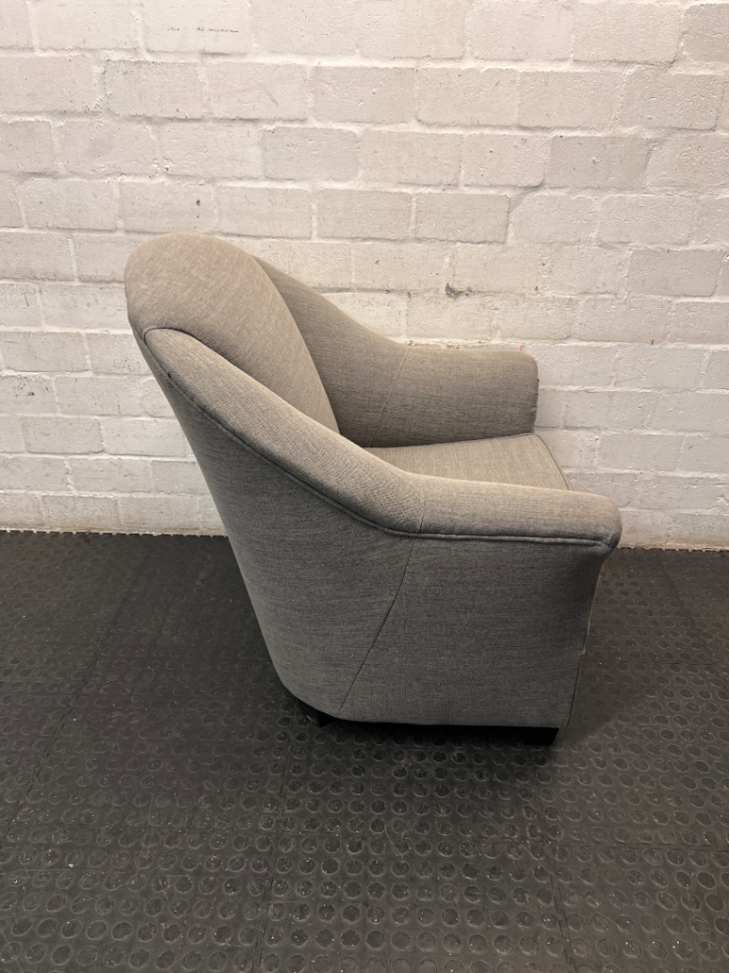 Grey Fabric Arched Armchair — Fair Condition with Visible Wear