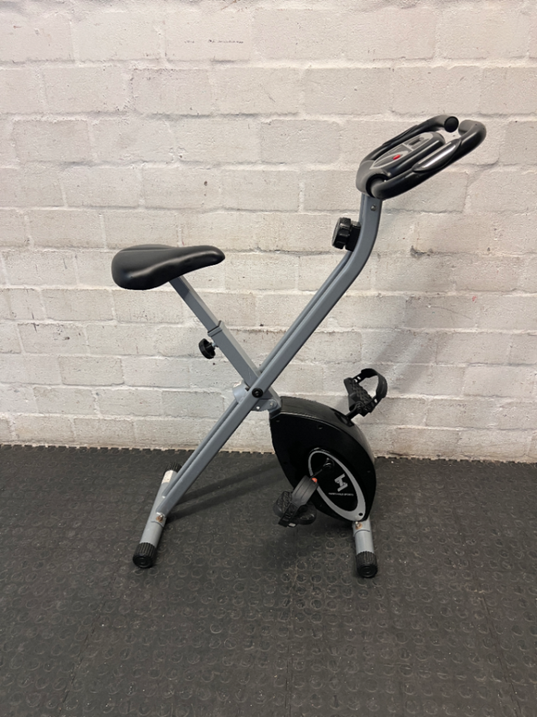 Grey and Black X-Frame Stationary Exercise Bike — Fair Used Condition