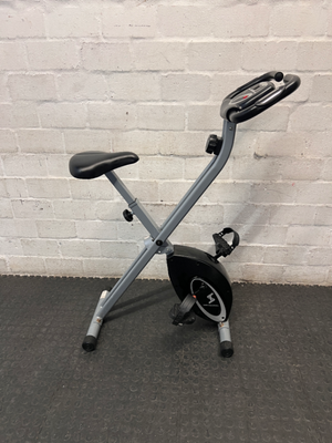 Grey and Black X-Frame Stationary Exercise Bike — Fair Used Condition