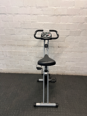 Grey and Black X-Frame Stationary Exercise Bike — Fair Used Condition
