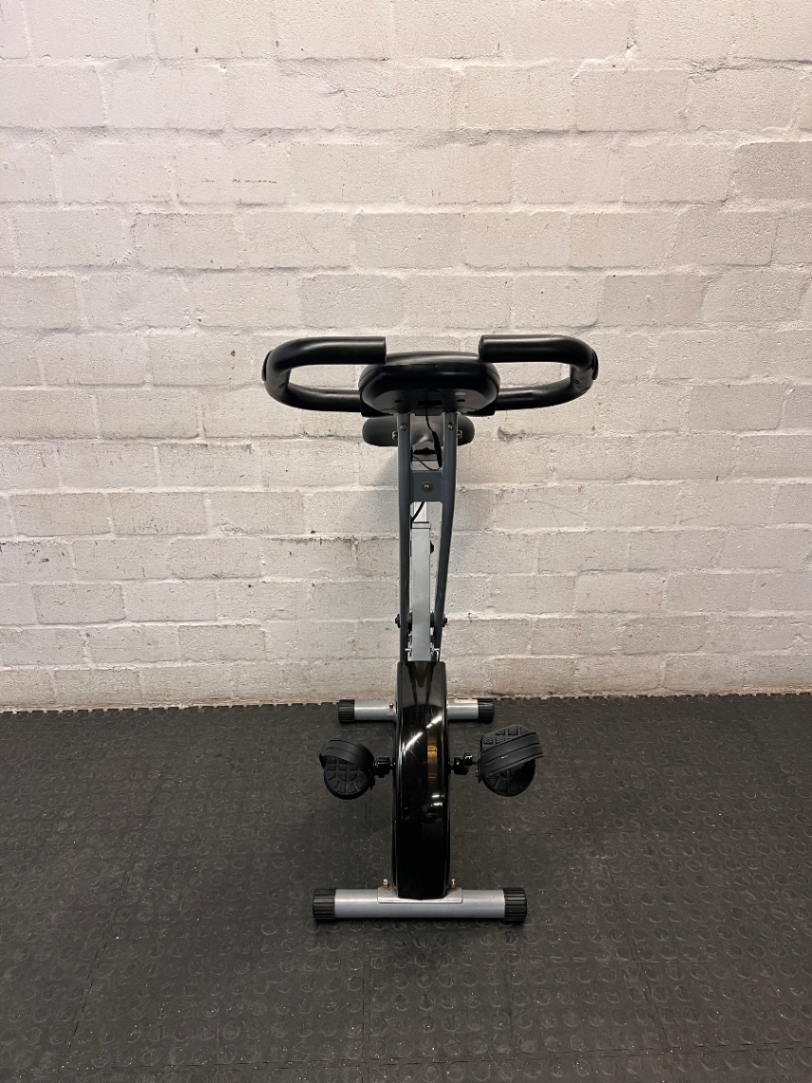 Grey and Black X-Frame Stationary Exercise Bike — Fair Used Condition