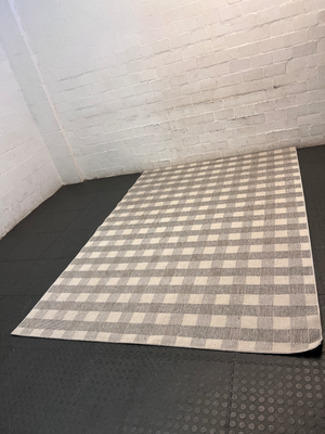 Grey and White Checkered Flat-Weave Floor Rug — Fair Used Condition