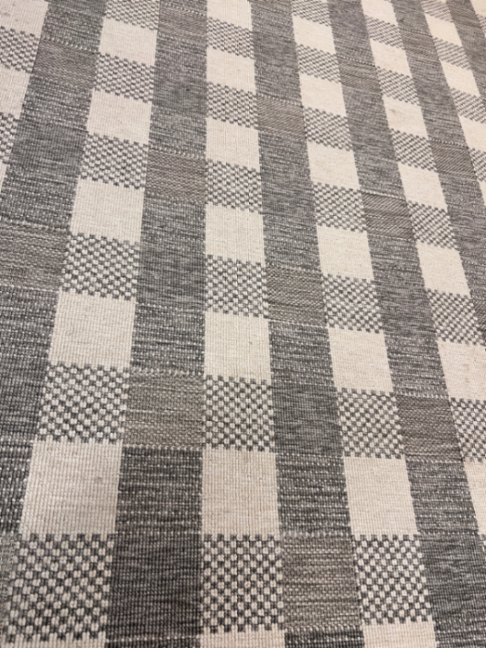 Grey and White Checkered Flat-Weave Floor Rug — Fair Used Condition
