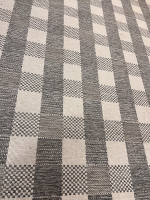 Grey and White Checkered Flat-Weave Floor Rug — Fair Used Condition