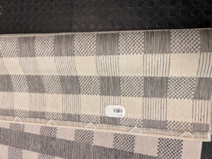 Grey and White Checkered Flat-Weave Floor Rug — Fair Used Condition