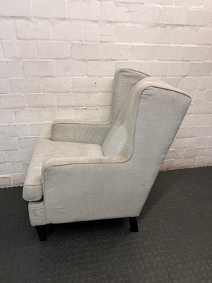 High Back Upholstered Wingchair in Light Grey — Good Working Order