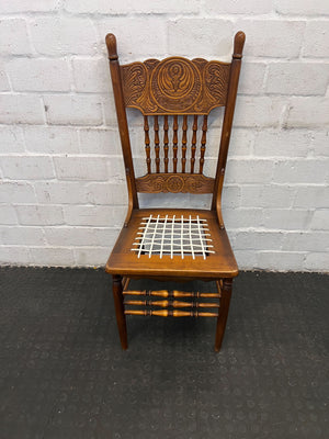 Vintage Carved Wooden Chair with Woven Seat – Timeless Elegance