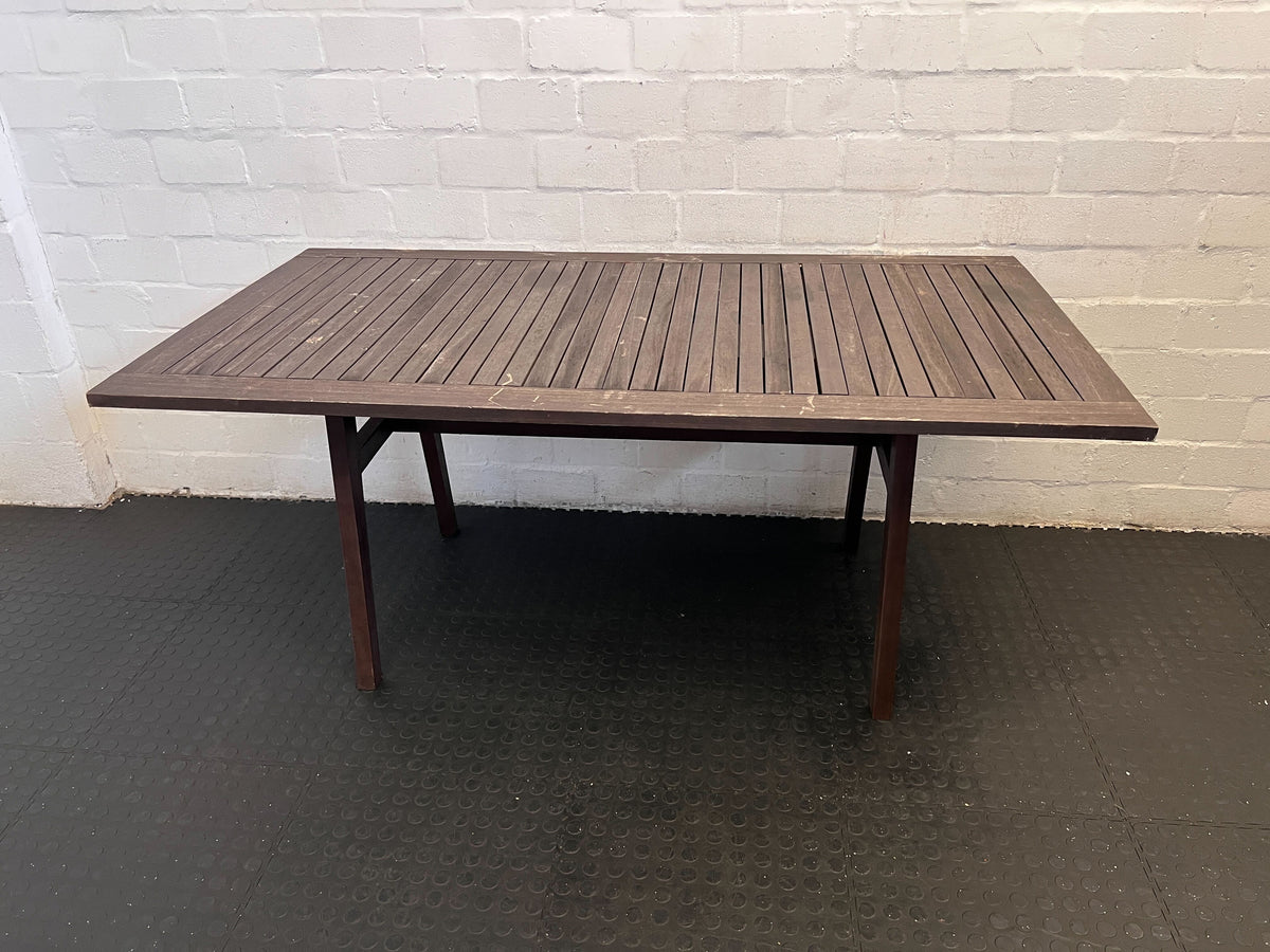 Stylish Dark Brown Wooden Dining Table with Minor Scratches