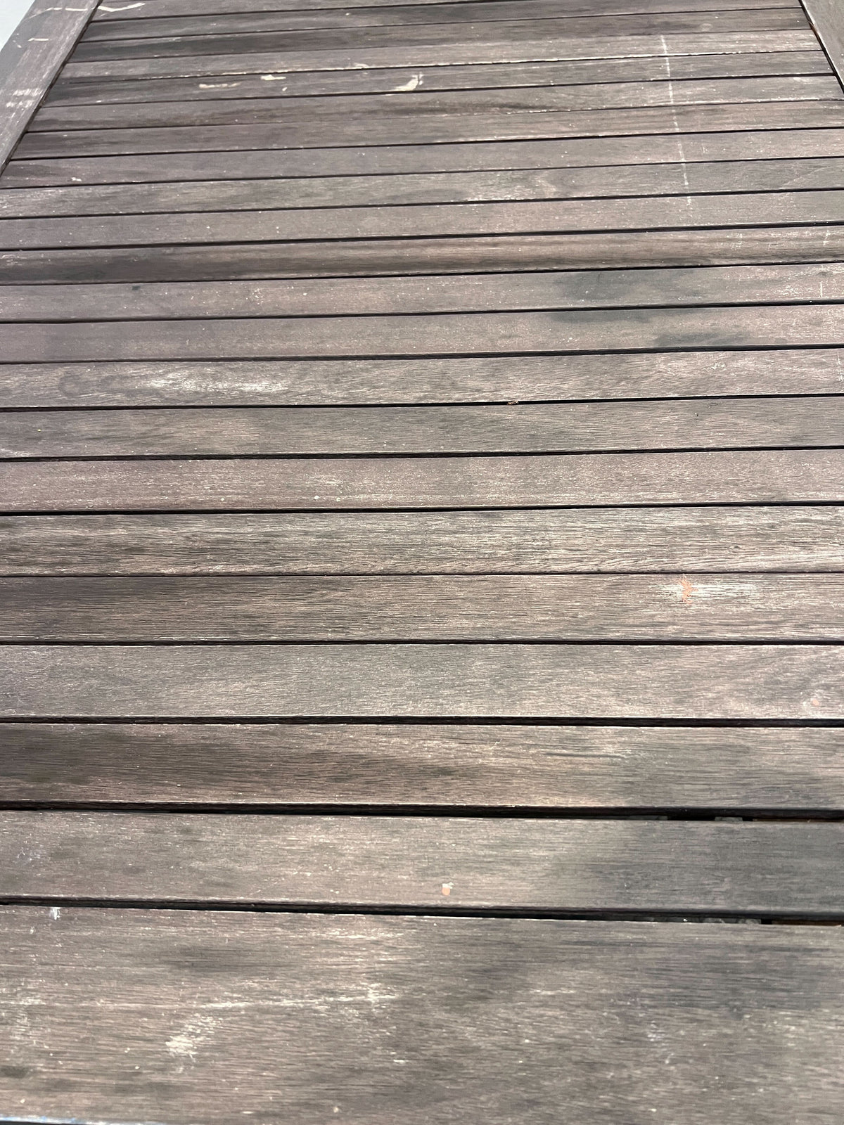 Stylish Dark Brown Wooden Dining Table with Minor Scratches