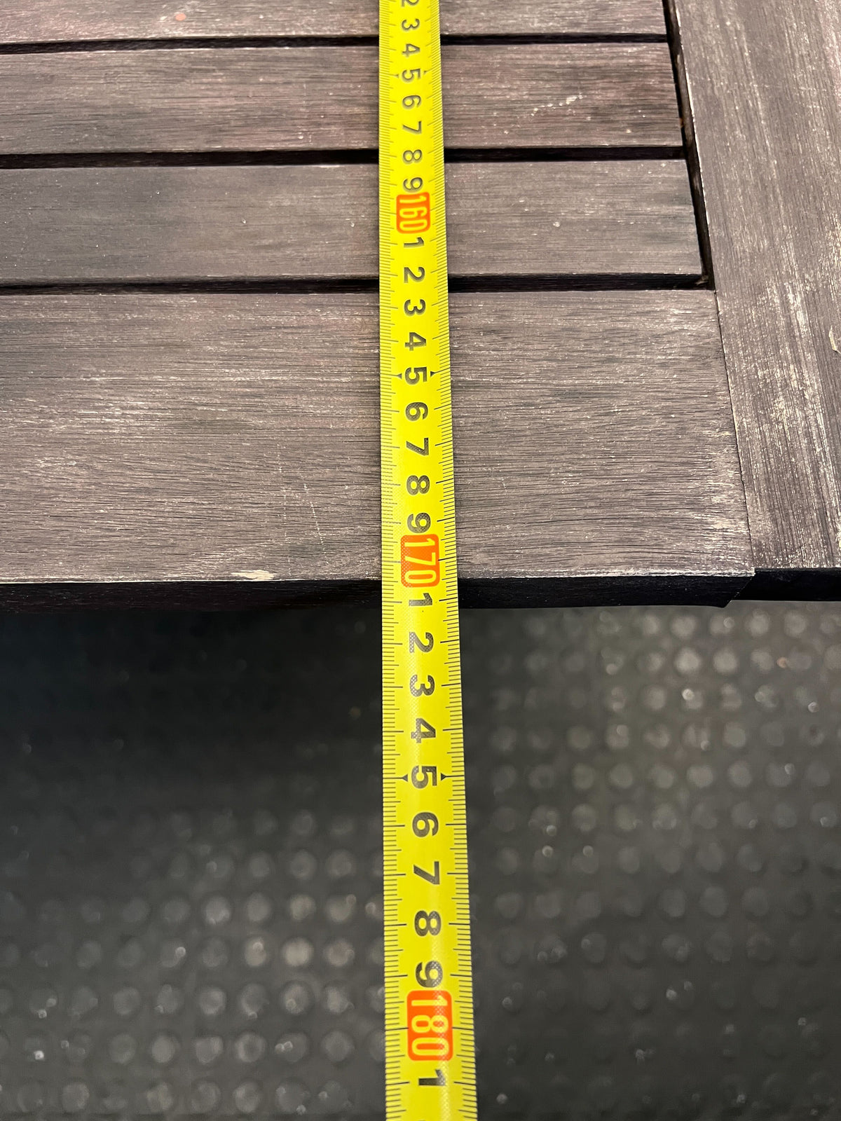 Stylish Dark Brown Wooden Dining Table with Minor Scratches