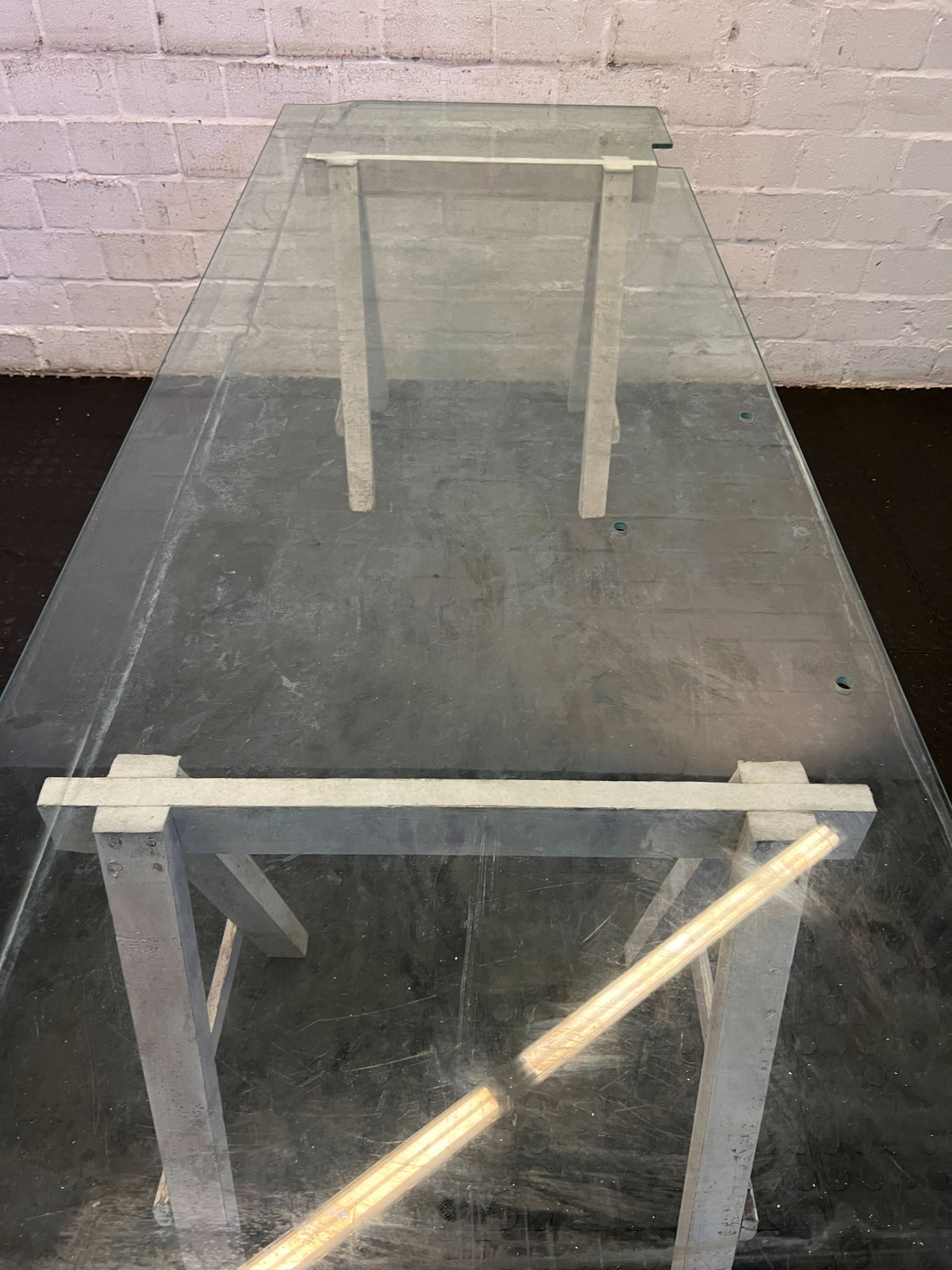 Stylish Glass-Top Table with White Wooden Base – Minor Wear - 2ndhandwarehouse.com