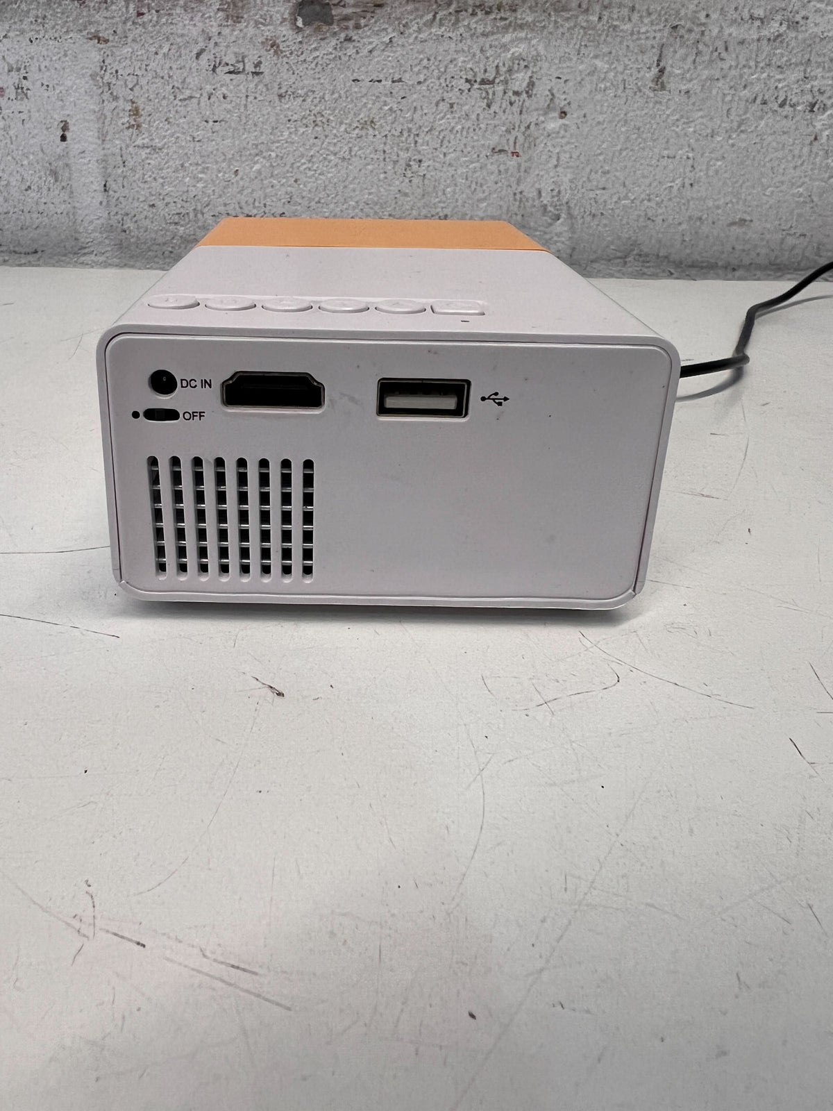 Compact Portable Projector in White and Orange – Minor Scratches