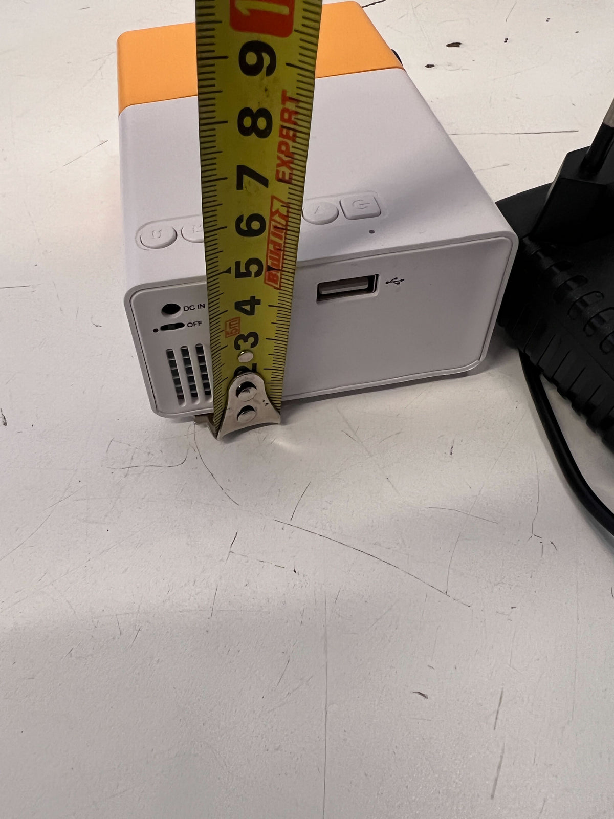 Compact Portable Projector in White and Orange – Minor Scratches