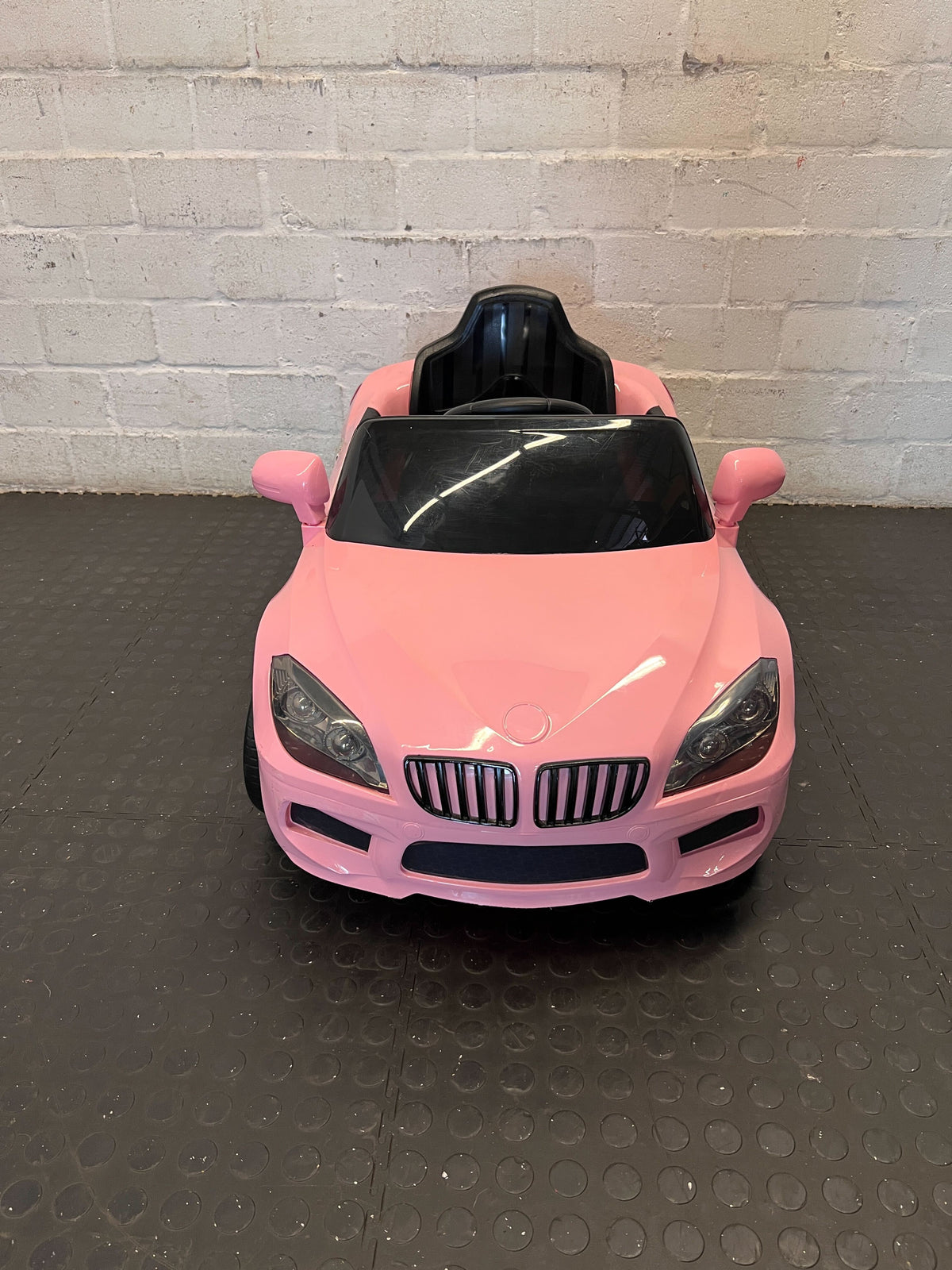 Kids pink electric car  - Pink Kids Electric Ride-On Car Toy - Has no charger - 2ndhandwarehouse.com