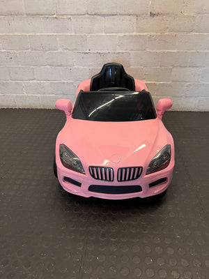 Kids pink electric car  - Pink Kids Electric Ride-On Car Toy - Has no charger - 2ndhandwarehouse.com