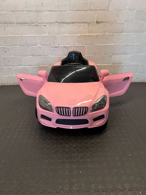 Kids pink electric car  - Pink Kids Electric Ride-On Car Toy - Has no charger - 2ndhandwarehouse.com