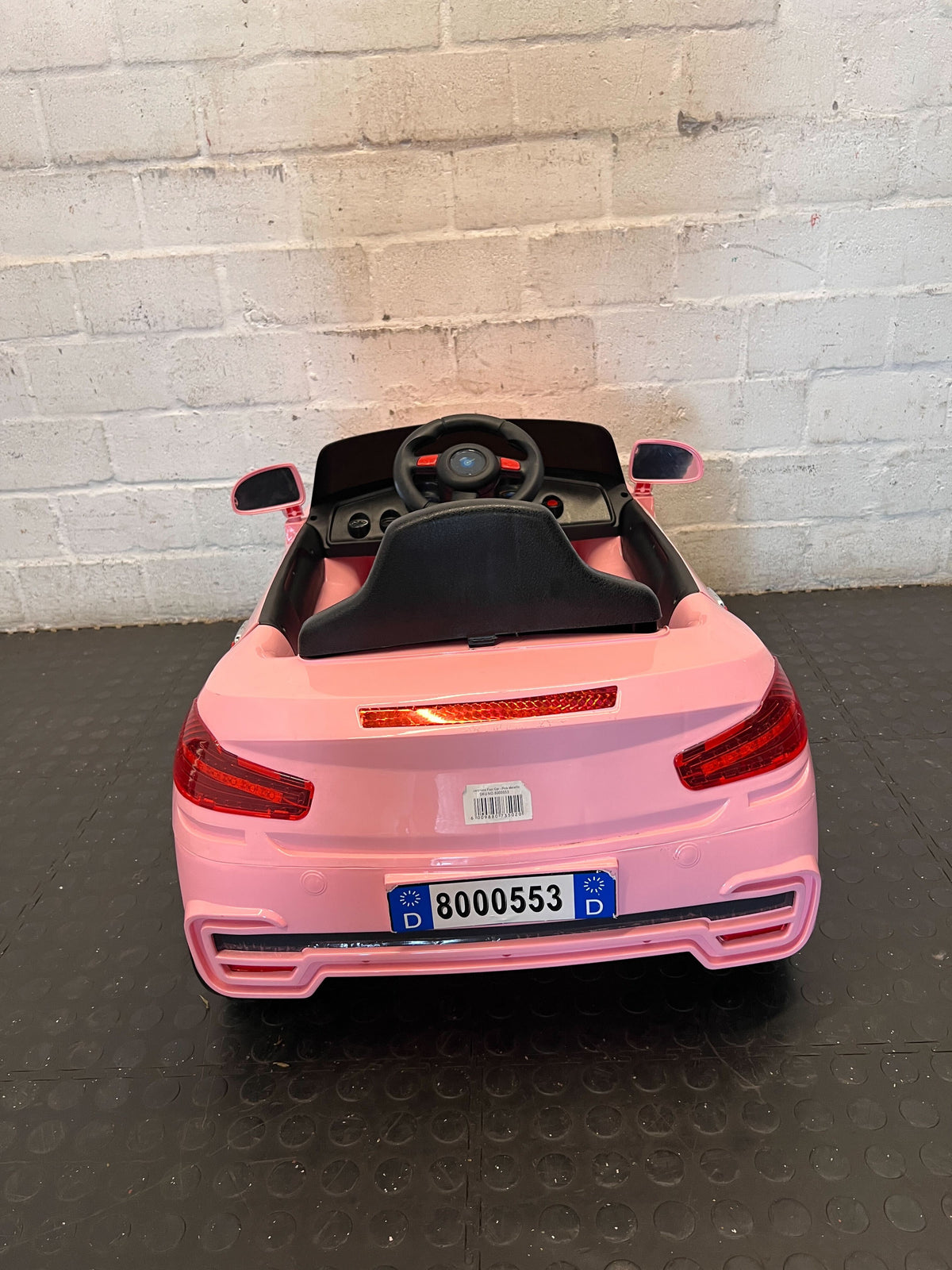 Kids pink electric car  - Pink Kids Electric Ride-On Car Toy - Has no charger - 2ndhandwarehouse.com
