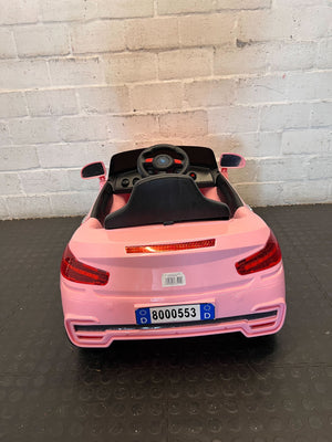 Kids pink electric car  - Pink Kids Electric Ride-On Car Toy - Has no charger - 2ndhandwarehouse.com