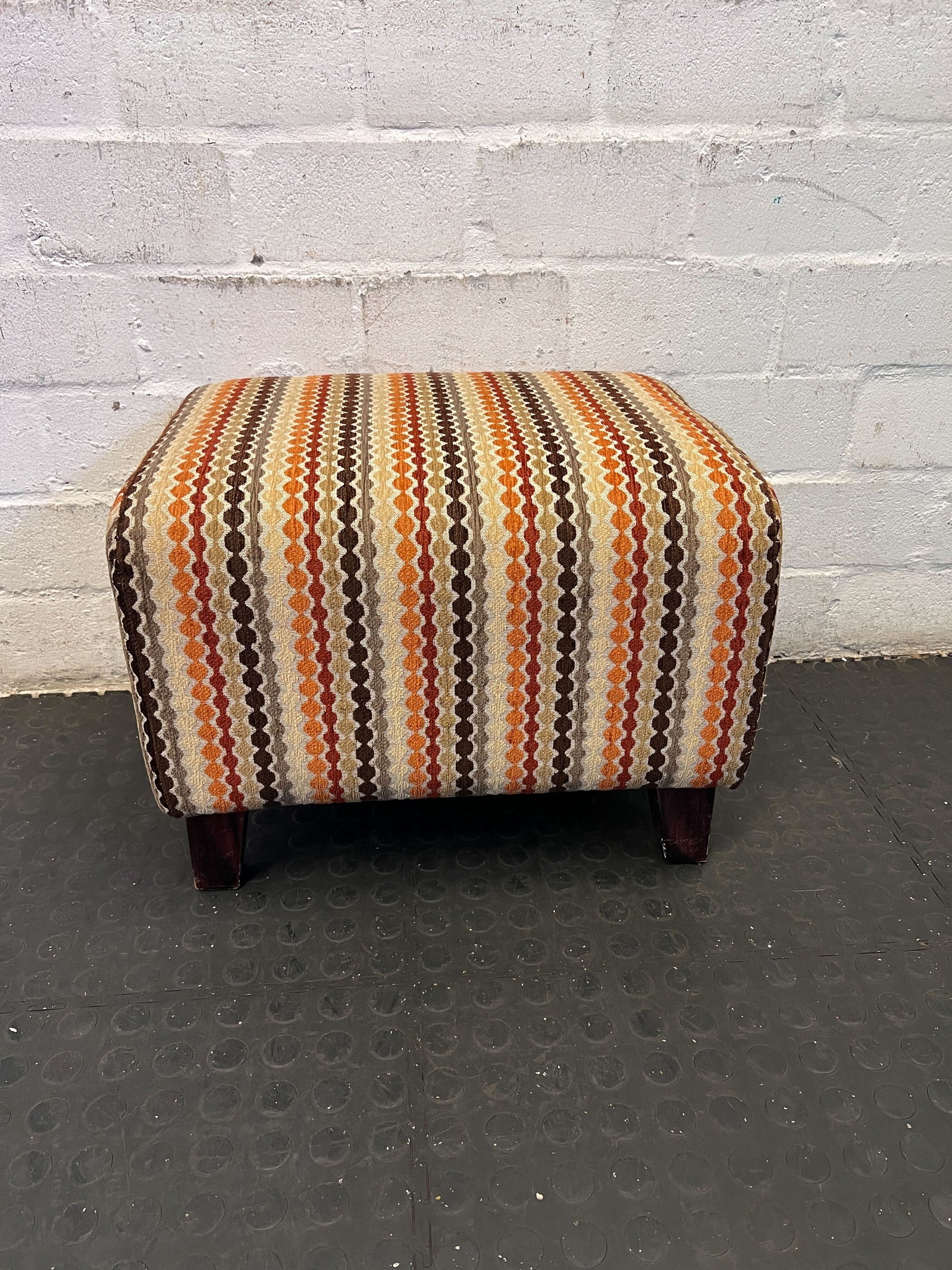 Vibrant Striped Fabric Ottoman with Wooden Legs