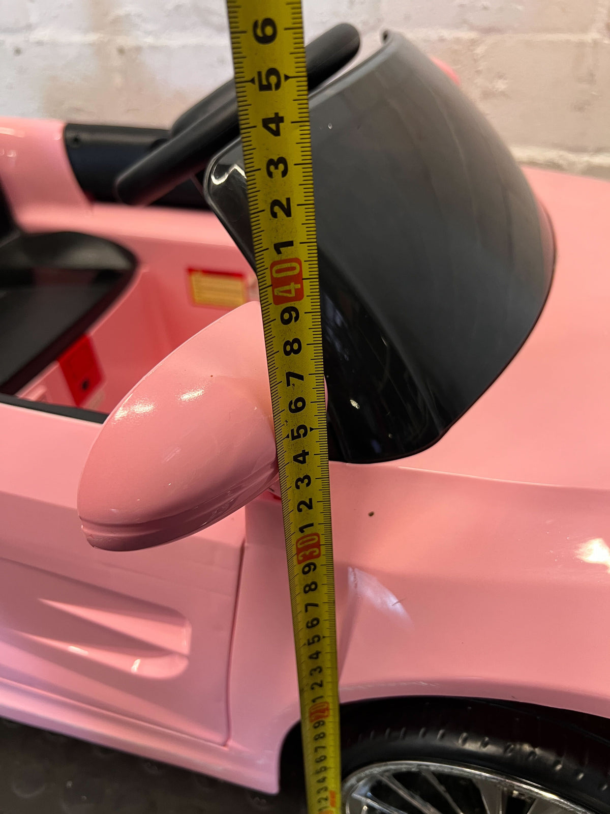 Kids pink electric car  - Pink Kids Electric Ride-On Car Toy - Has no charger - 2ndhandwarehouse.com