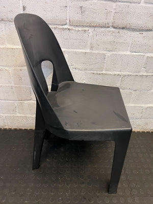 Sturdy Black Plastic Stackable Chair - Minor Wear, Great for Outdoor Use