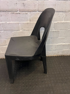 Sturdy Black Plastic Stackable Chair - Minor Wear, Great for Outdoor Use
