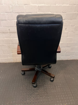 Comfortable Black Leather Office Chair with Wooden Arms – Slight Wear