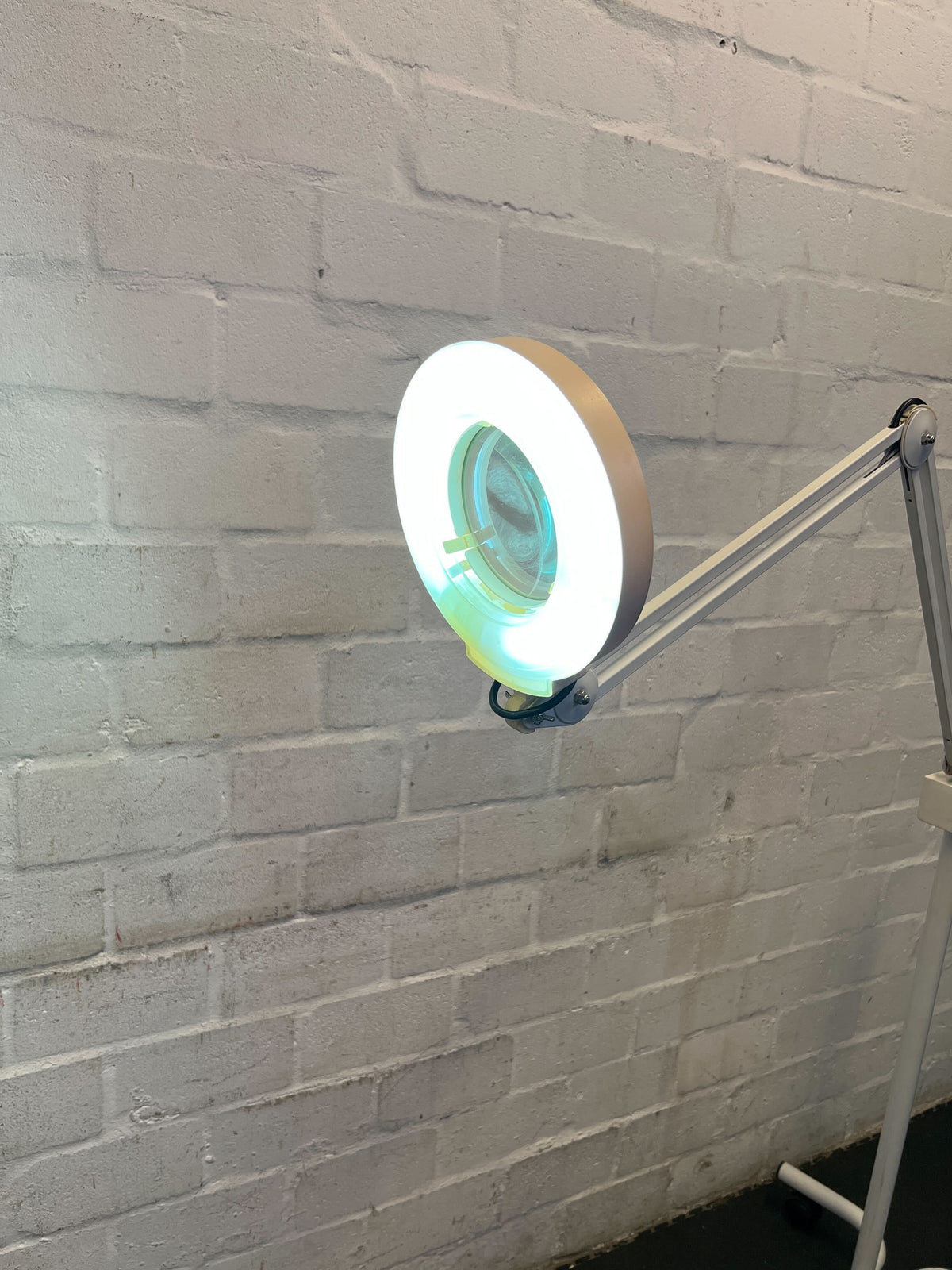 Versatile Adjustable White LED Floor Lamp with Rolling Base