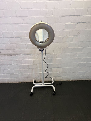 Versatile Adjustable White LED Floor Lamp with Rolling Base