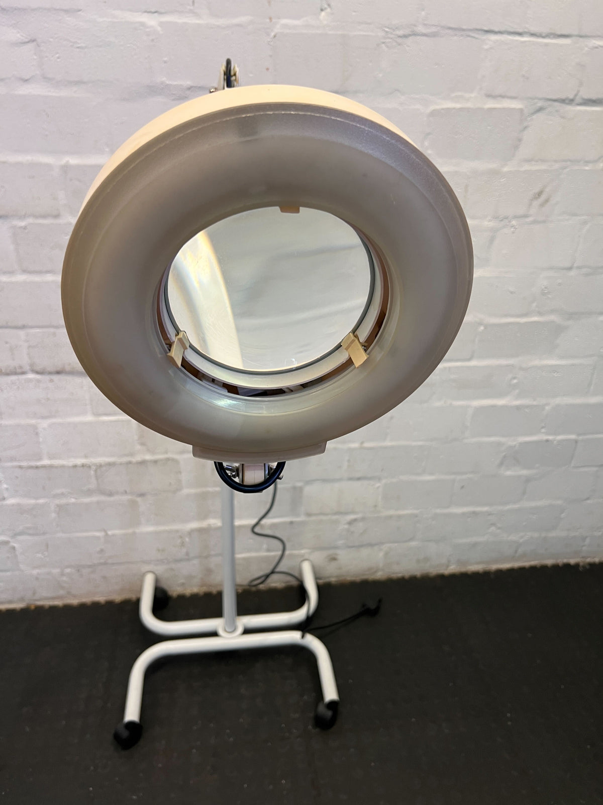 Versatile Adjustable White LED Floor Lamp with Rolling Base