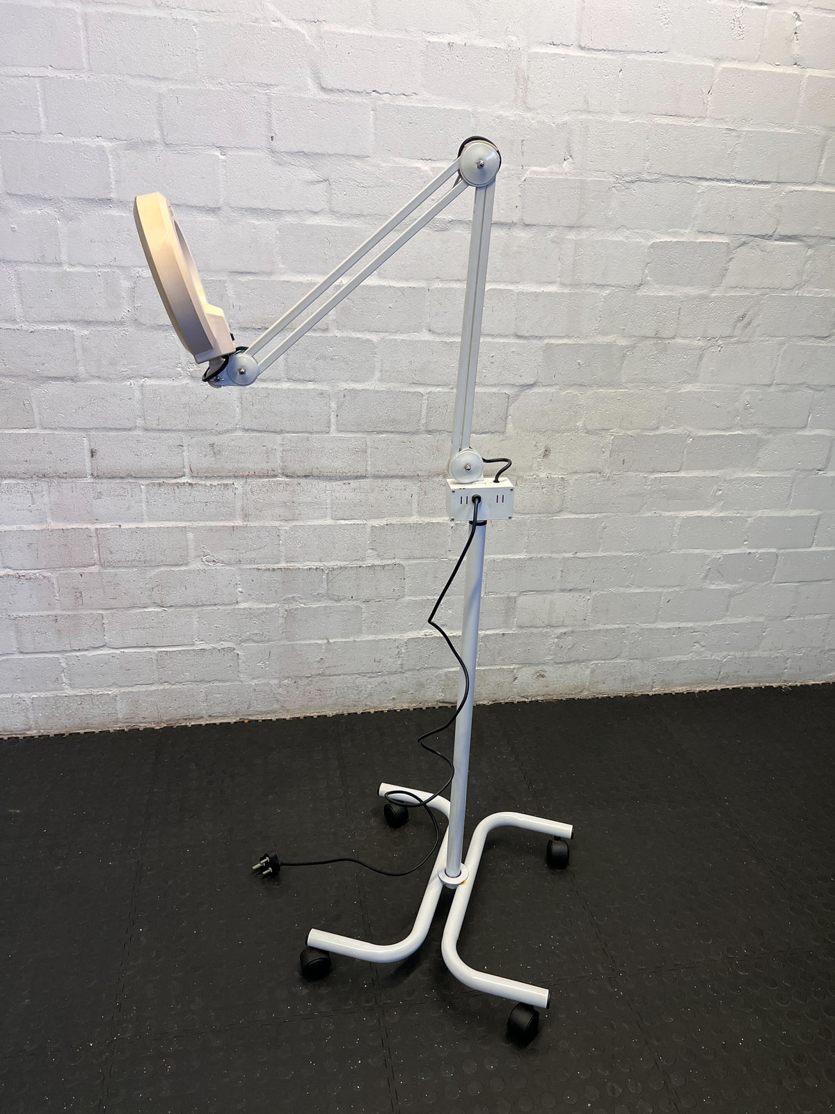 Versatile Adjustable White LED Floor Lamp with Rolling Base