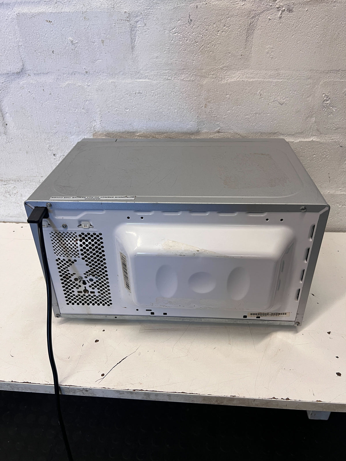 Russell Hobbs Microwave Oven - Sleek Silver Finish - has rust - 2ndhandwarehouse.com