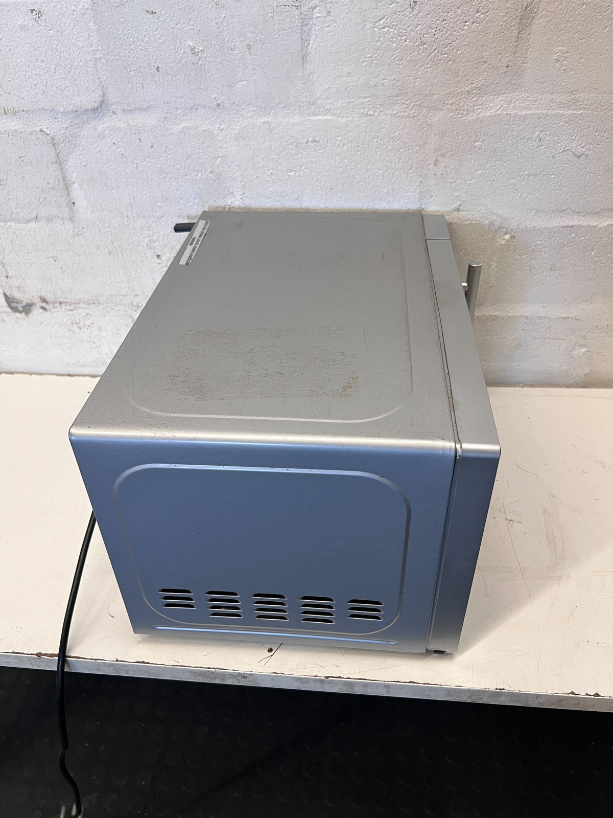 Russell Hobbs Microwave Oven - Sleek Silver Finish - has rust - 2ndhandwarehouse.com