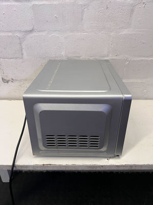 Compact Silver Microwave Oven - Quick Meals Made Easy! ✨