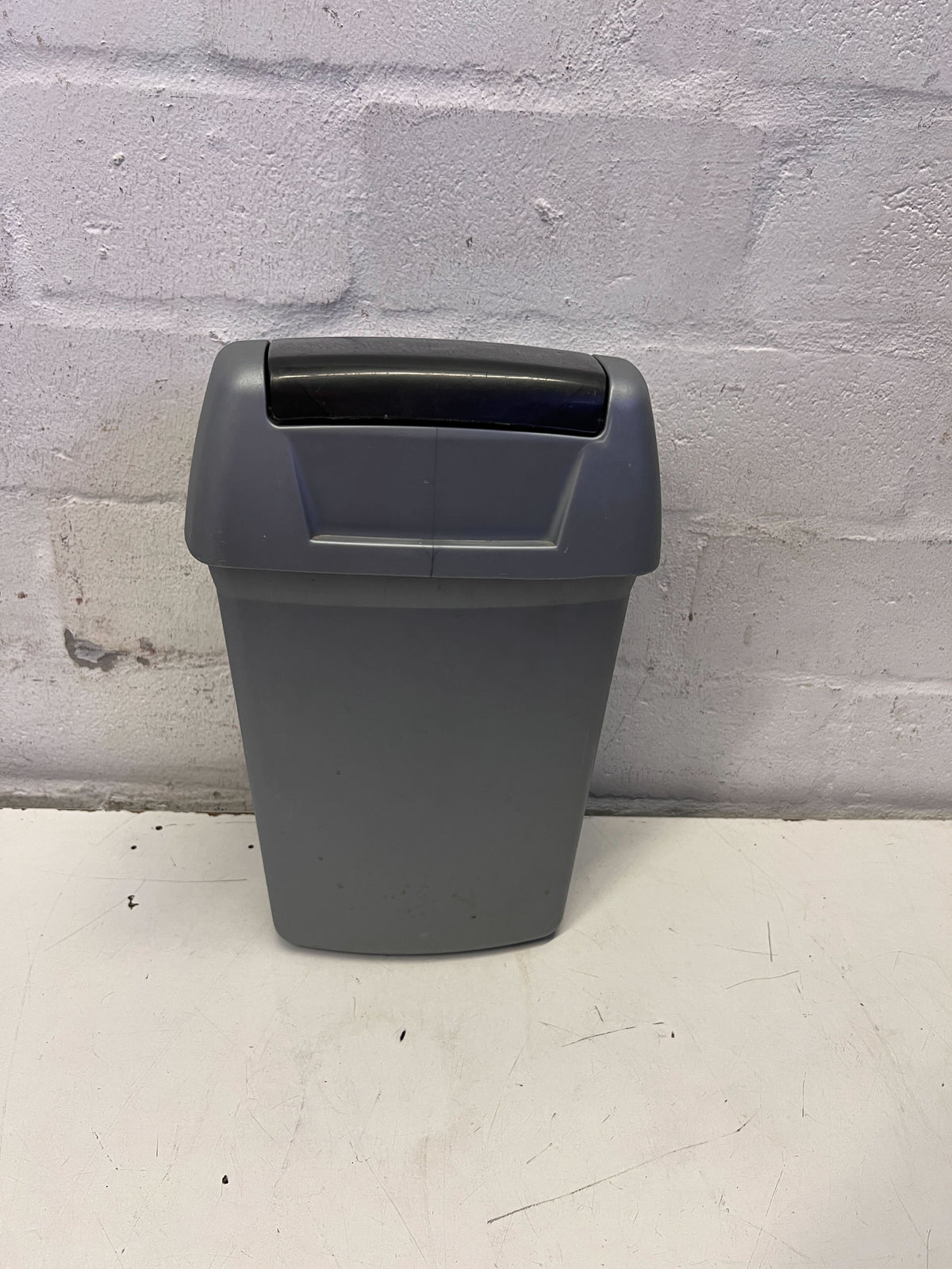 Versatile Grey Swing Lid Bin - Compact Waste Solution