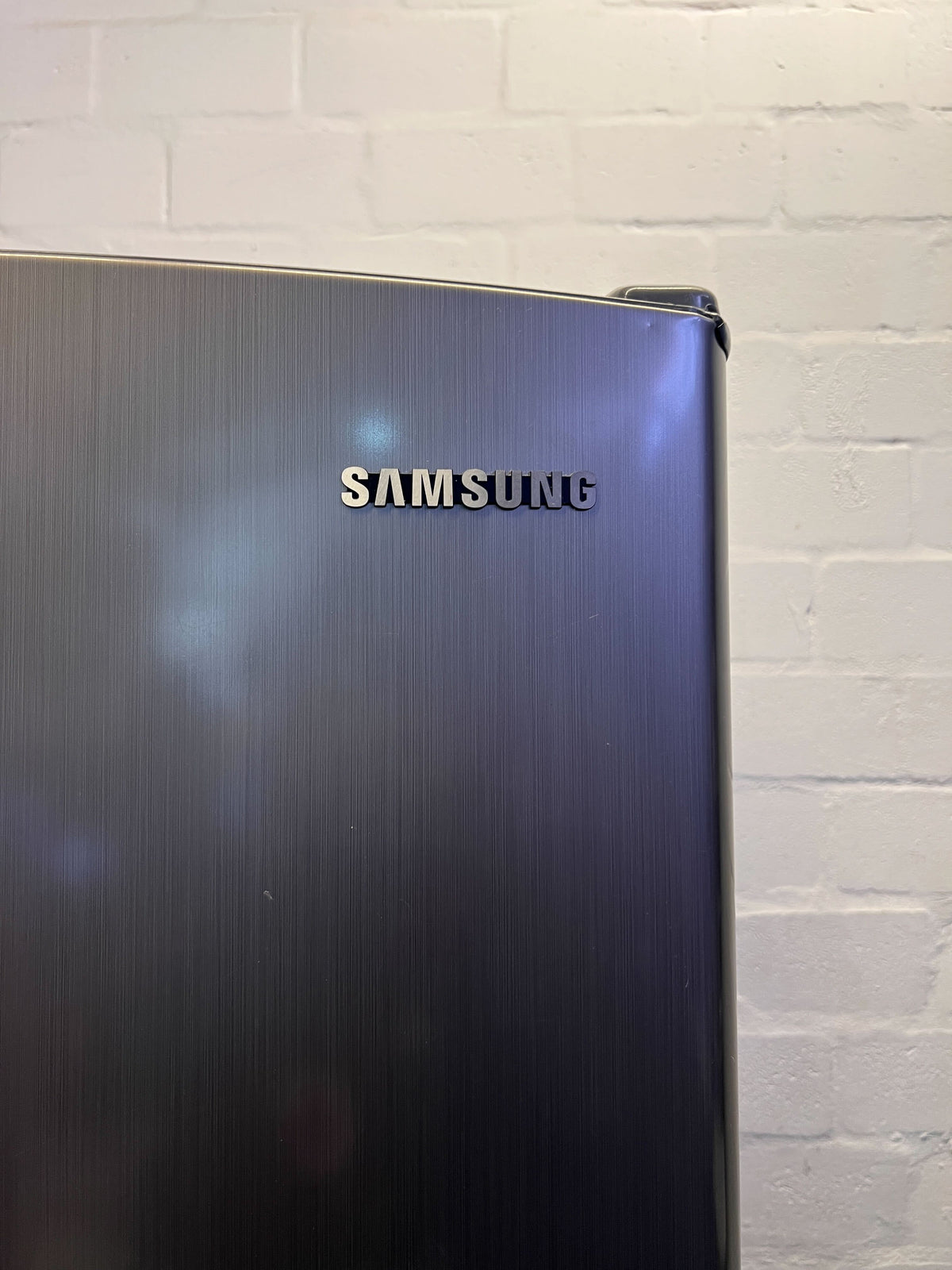 Sleek Samsung Bottom Freezer Fridge - Water Dispenser Included