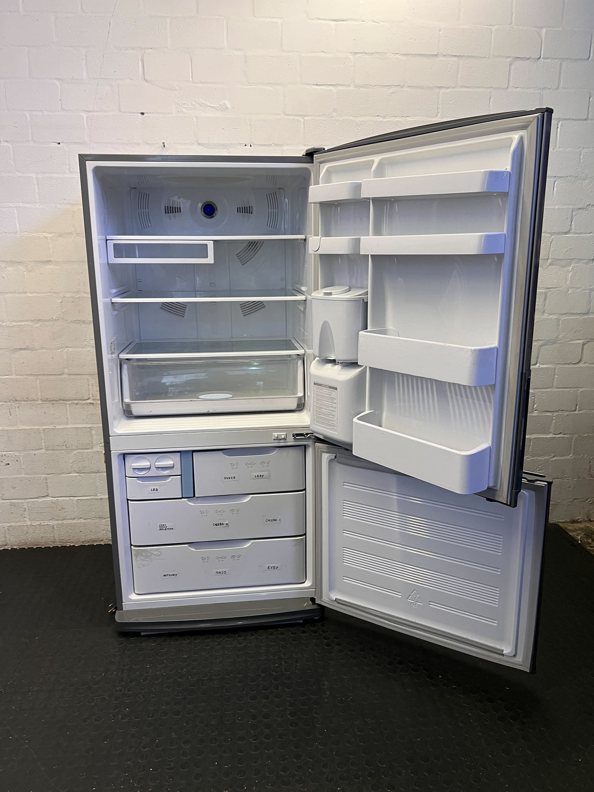 Sleek Samsung Bottom Freezer Fridge - Water Dispenser Included