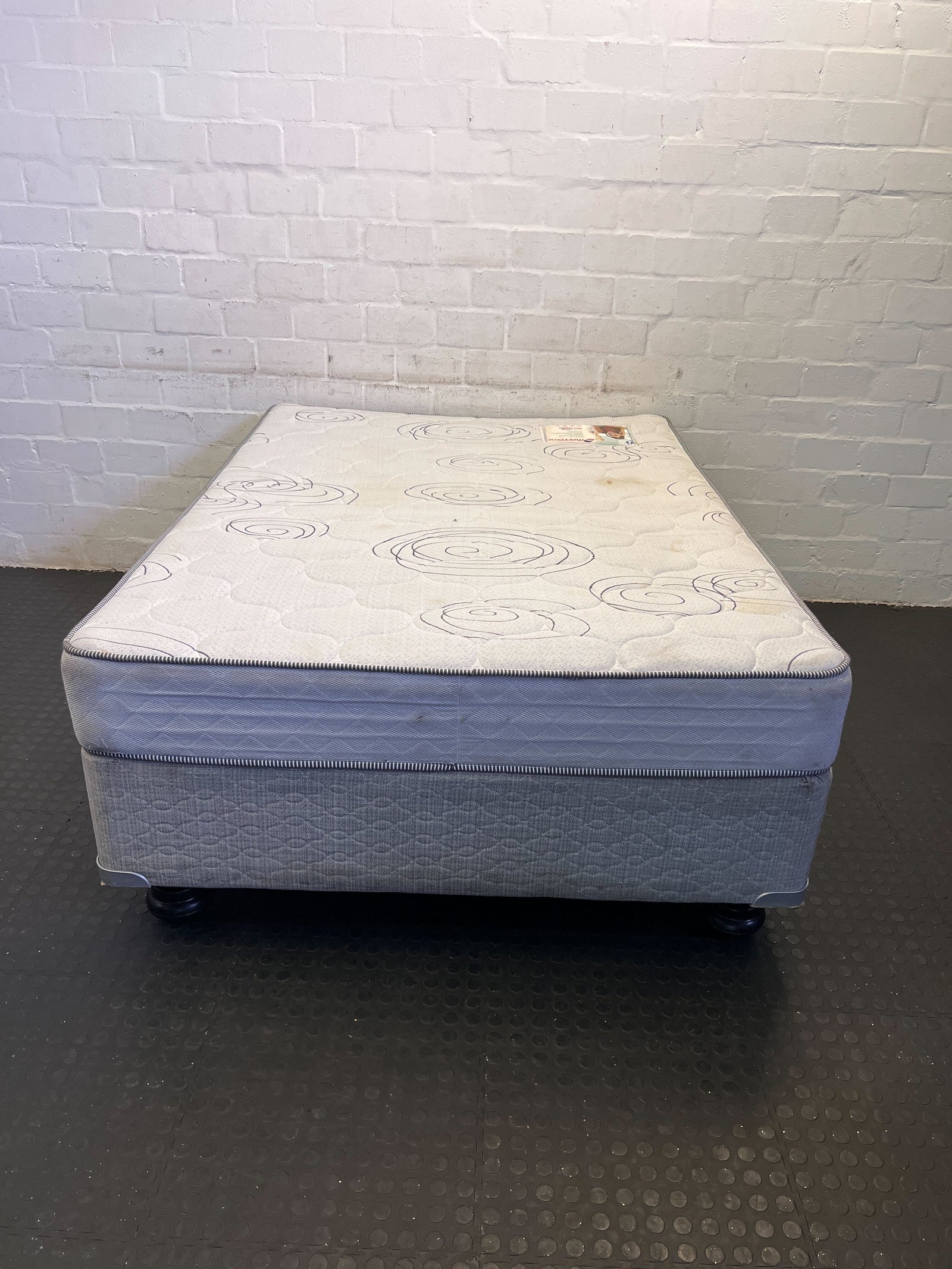 Comfortable Grey Double Mattress with Minor Wear