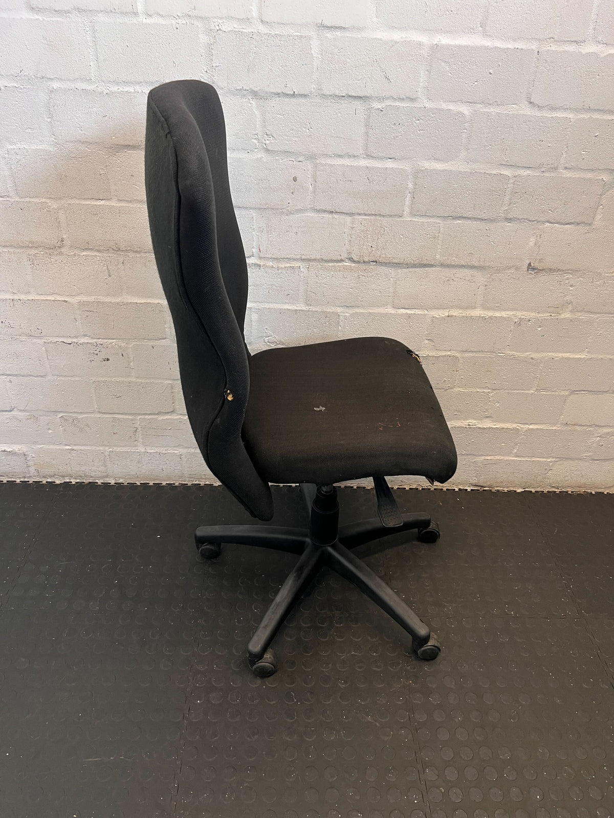 Comfortable Black Fabric Office Chair with Minor Wear