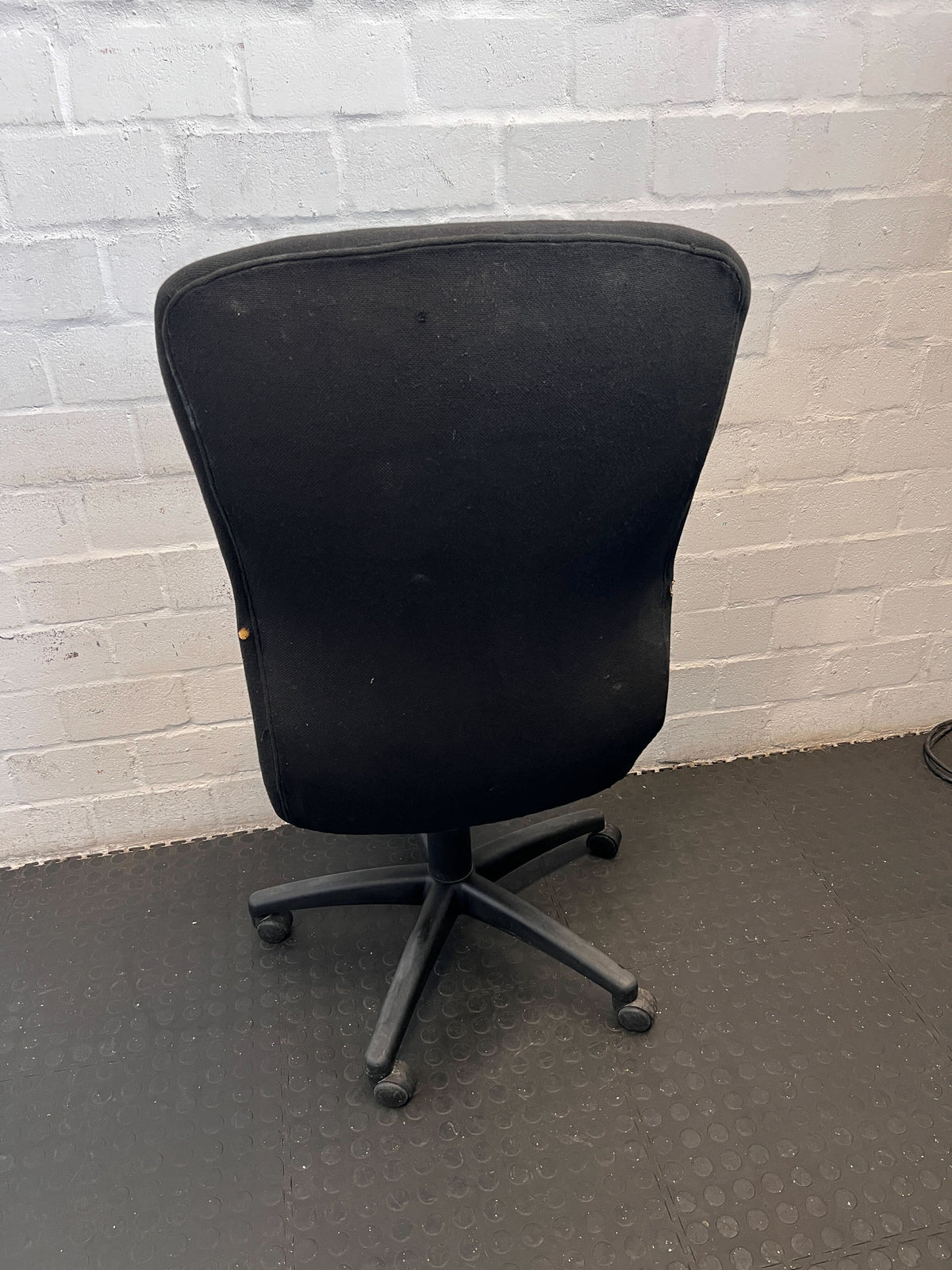 Comfortable Black Fabric Office Chair with Minor Wear