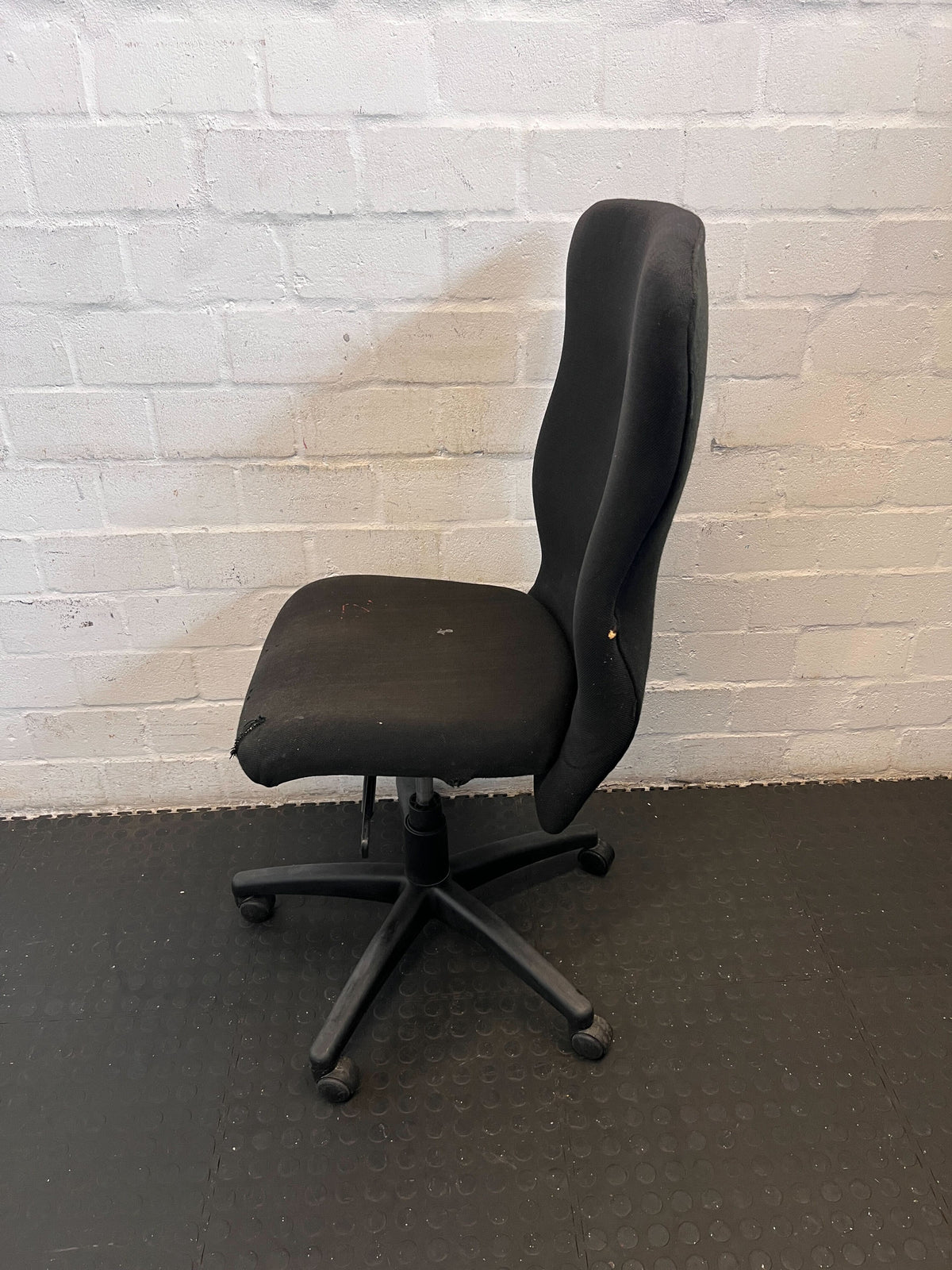 Comfortable Black Fabric Office Chair with Minor Wear