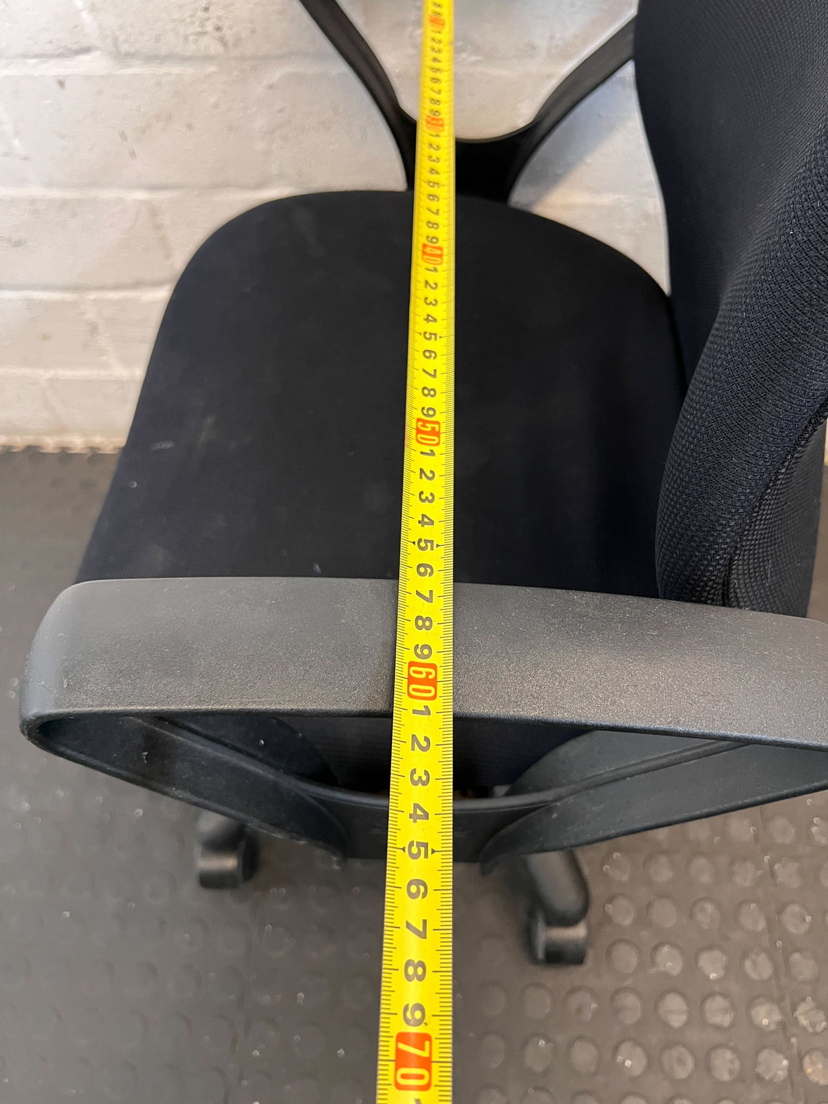 Comfortable Black Office Chair with Minor Wear