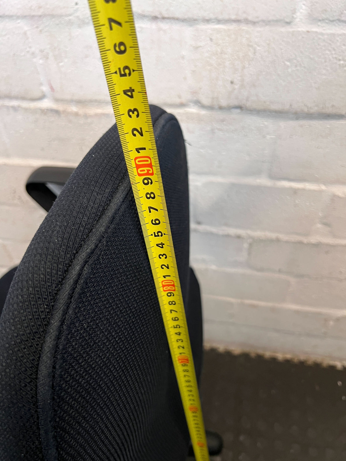 Comfortable Black Office Chair with Minor Wear