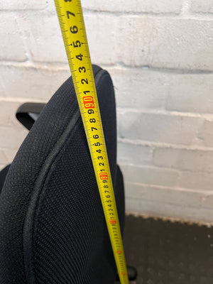 Comfortable Black Office Chair with Minor Wear