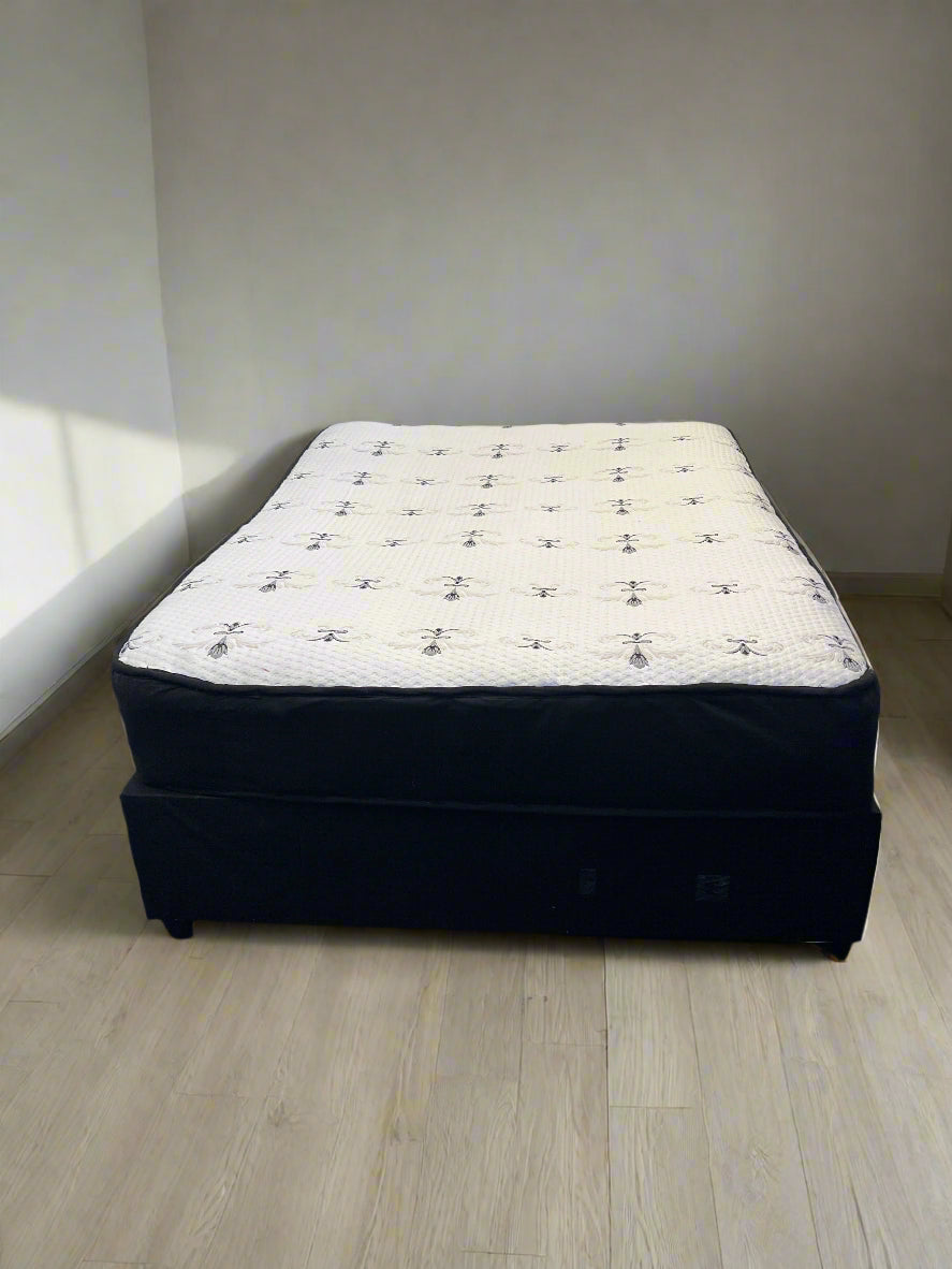 Comfortable Double Bed Mattress with Sturdy Base – Good Condition